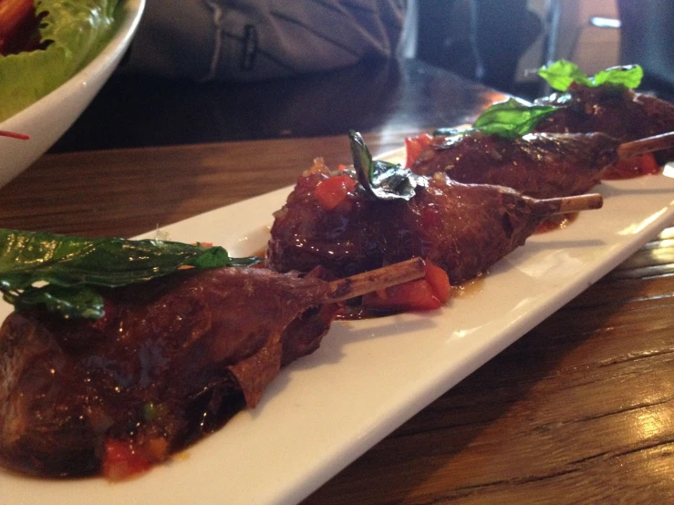 a closeup of a plate with beef on it