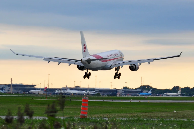 a large jetliner taking off into the sky