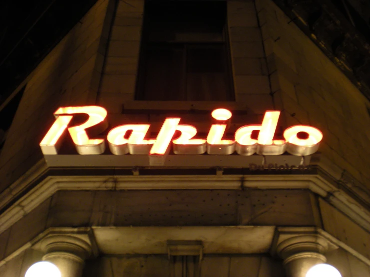 the neon sign has been changed to say rapido