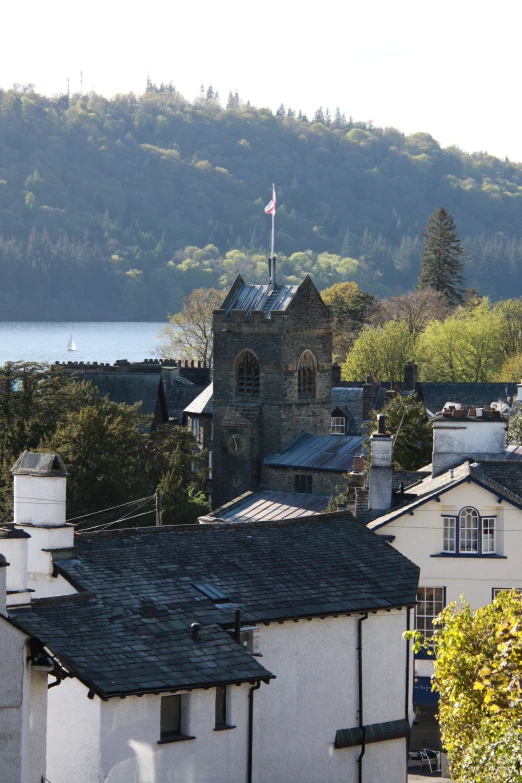 a small town near a lake with some boats