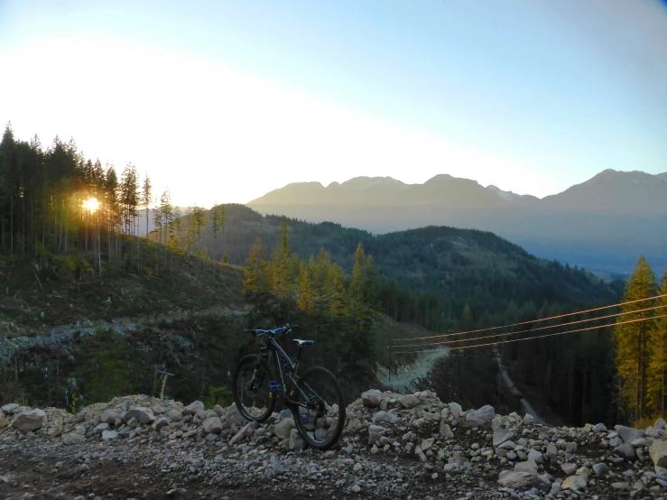 there is a bicycle on the rocky surface