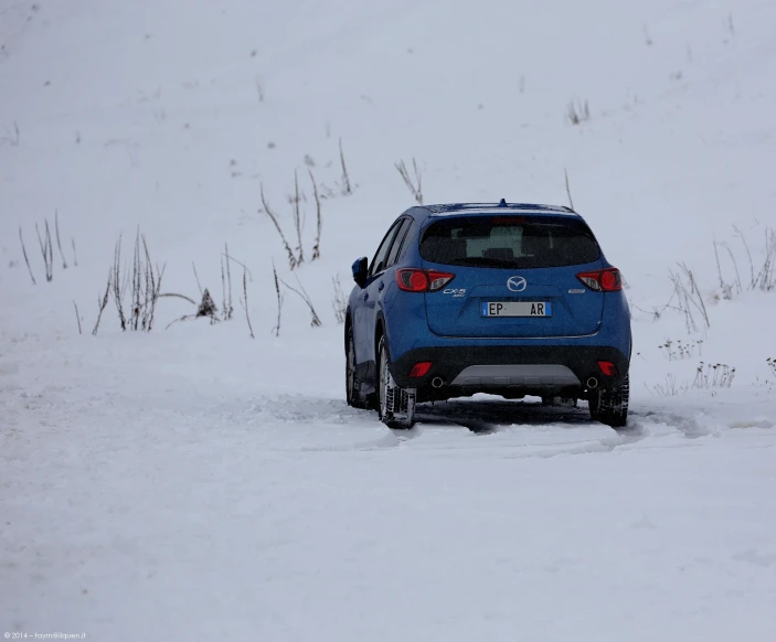 the car is stopped on the snowy road