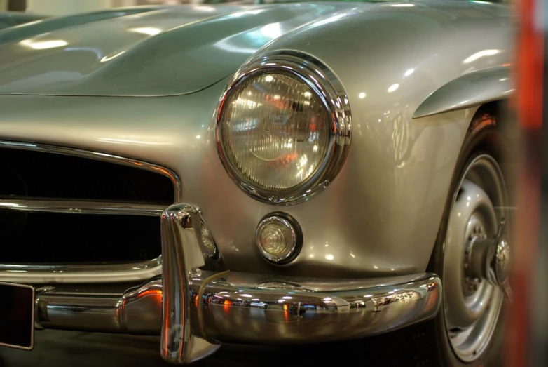 the front end of an old mercedes car