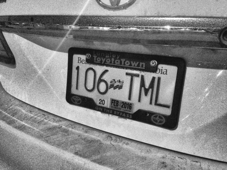 a license plate on a car, with the license number 1065 tml