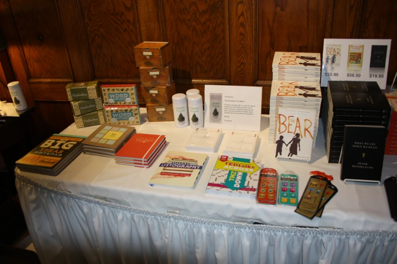 a table topped with many different types of pamphlets