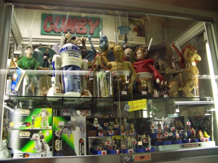 a display case with lots of star wars toy