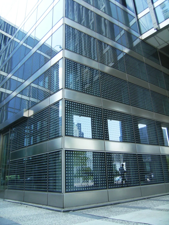 this building has a glass and steel facade
