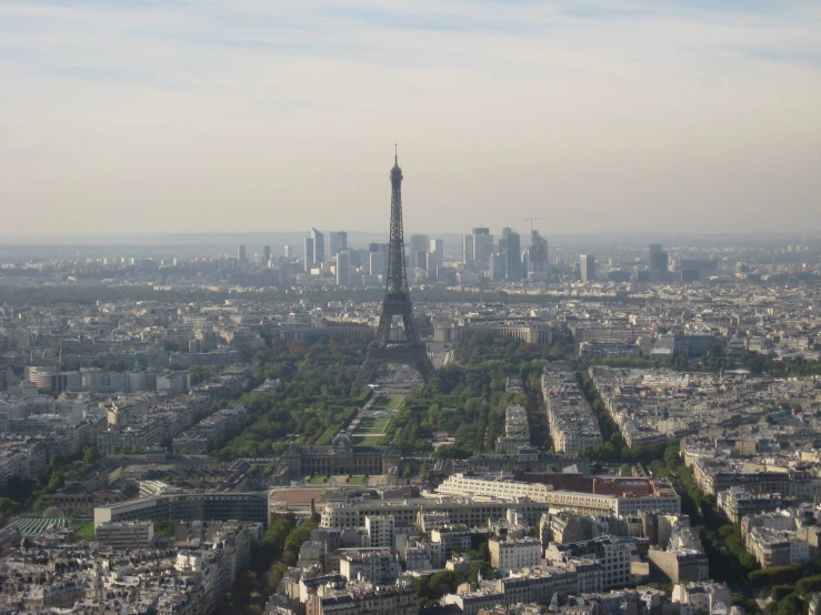 an aerial view of the city and the eiffel tower