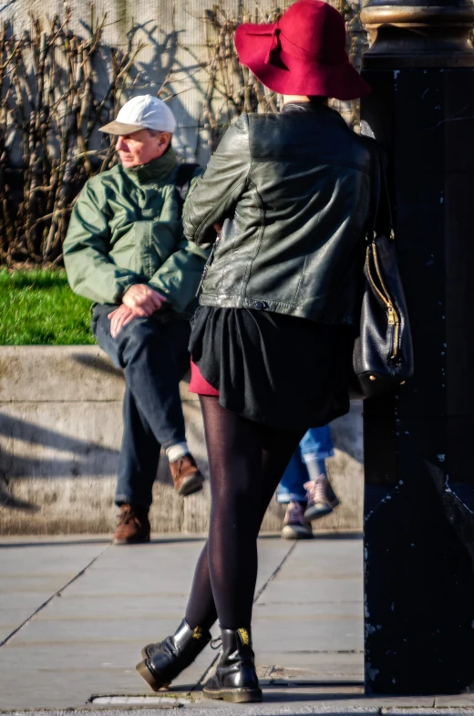 two older woman on the corner on a sidewalk