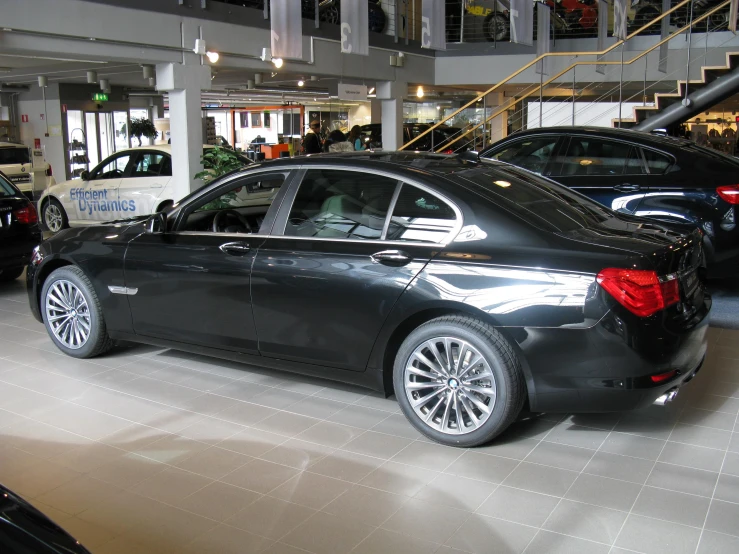 a bmw car parked in a large mall