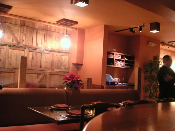 man standing at the counter in a restaurant