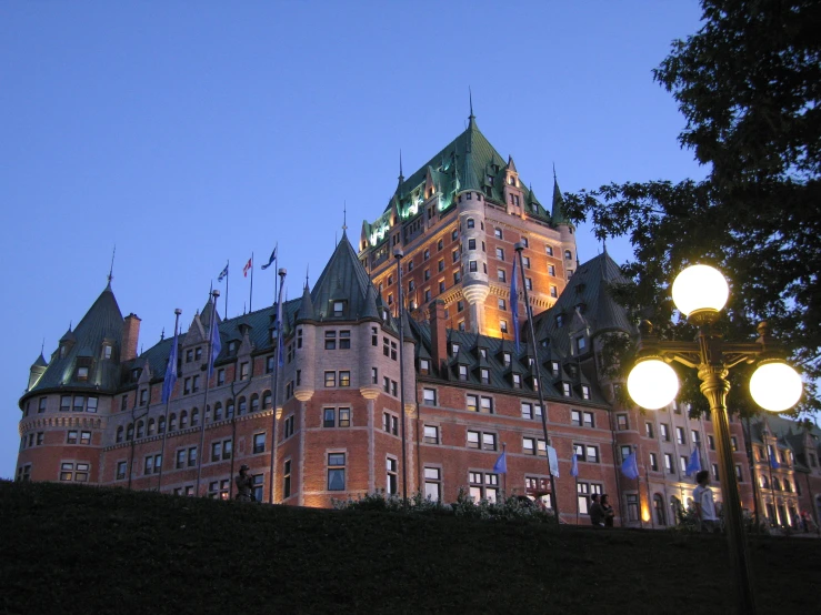 an ornate building with lights on and lights lit up