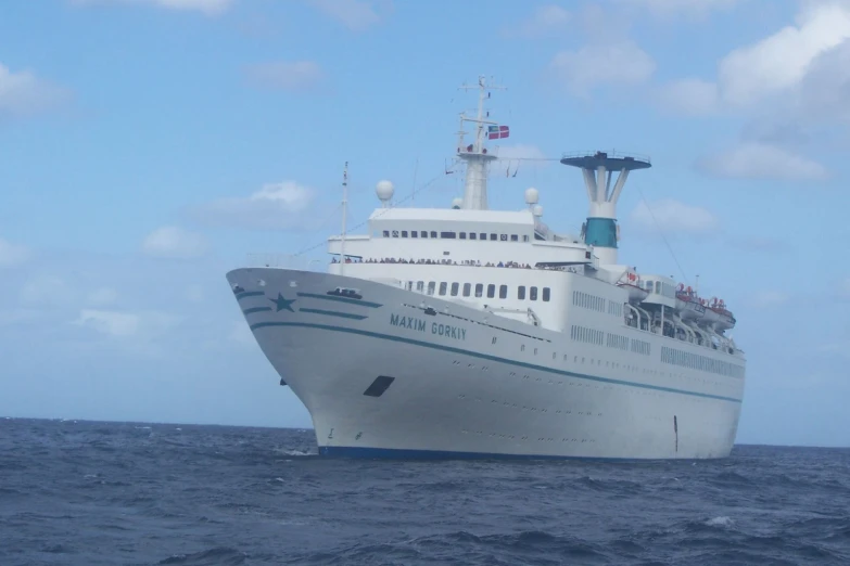 a cruise ship traveling through the open ocean