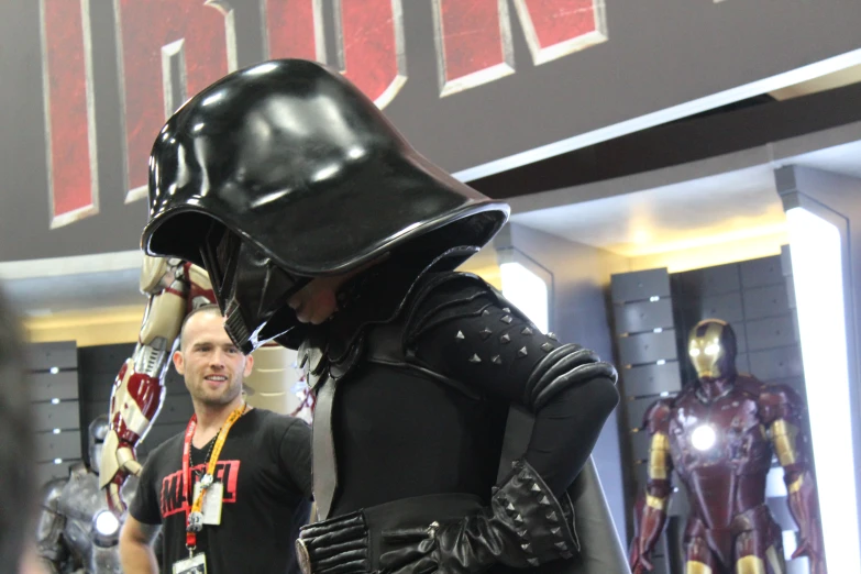 a couple of men standing next to each other in costume