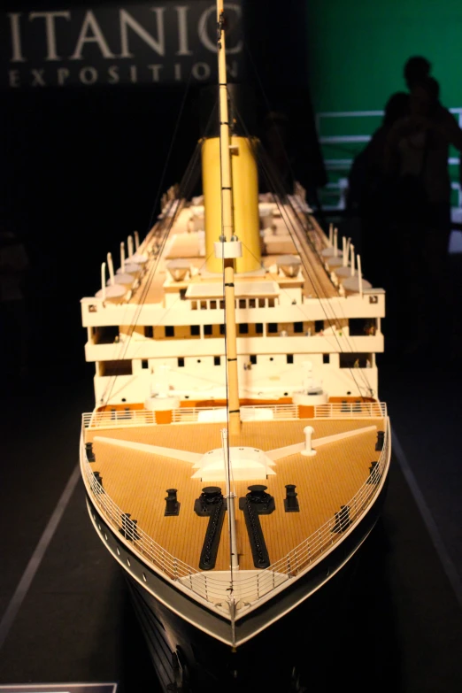 a large model ship is on display at the exhibition