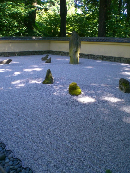 an empty stone garden has rocks piled high