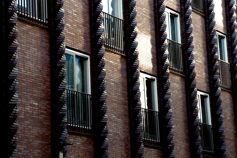 the outside of a building with a clock and window