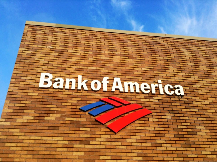 bank of america sign on brick wall with sky background