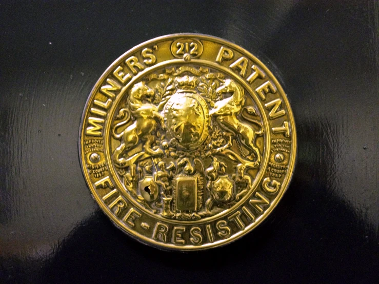 a coin with the emblem of a marine animal on it