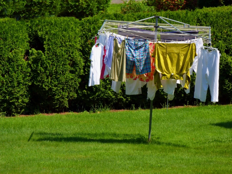 clothes are hung outside and drying outside in the sun