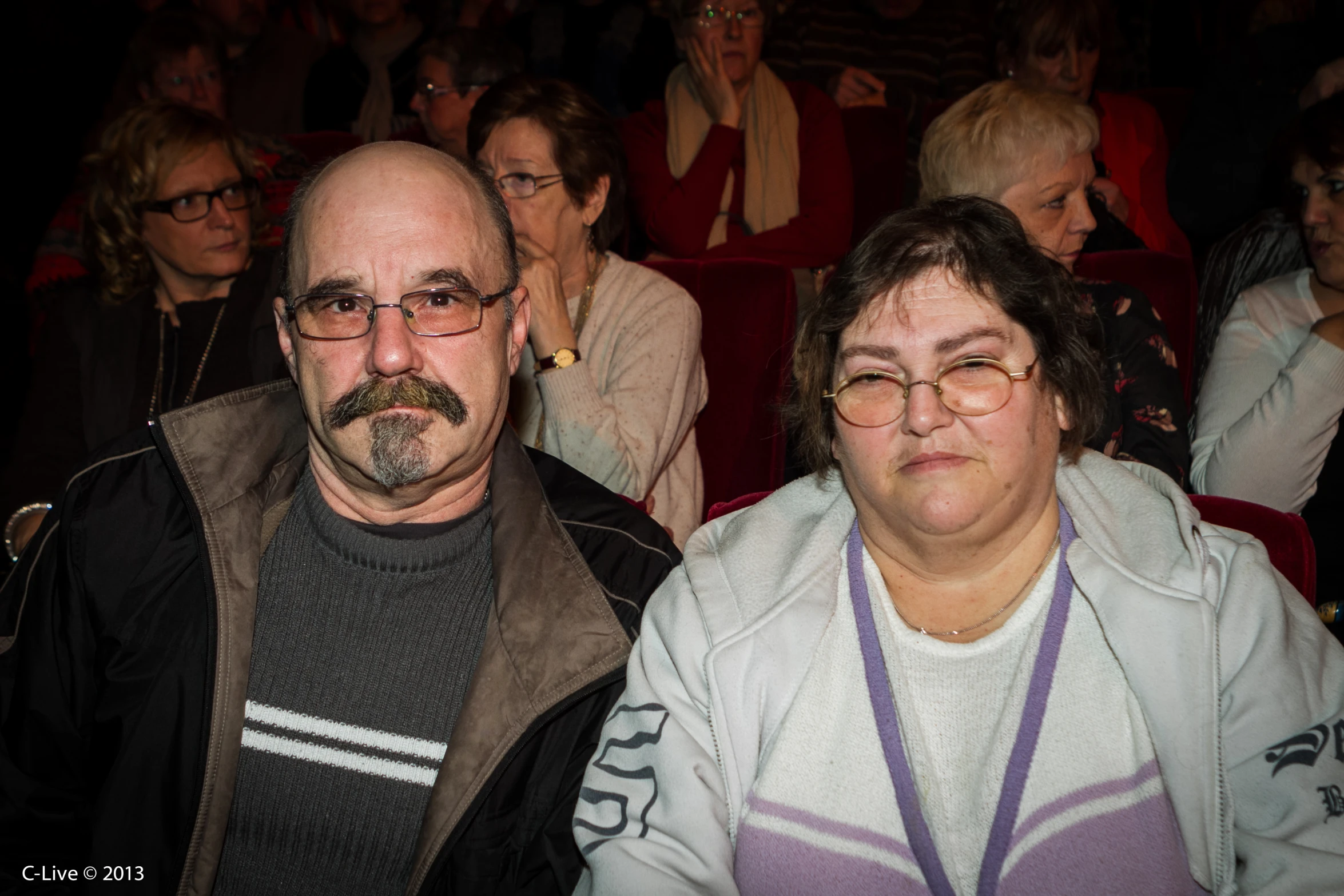 people at an event with focus on the elderly man