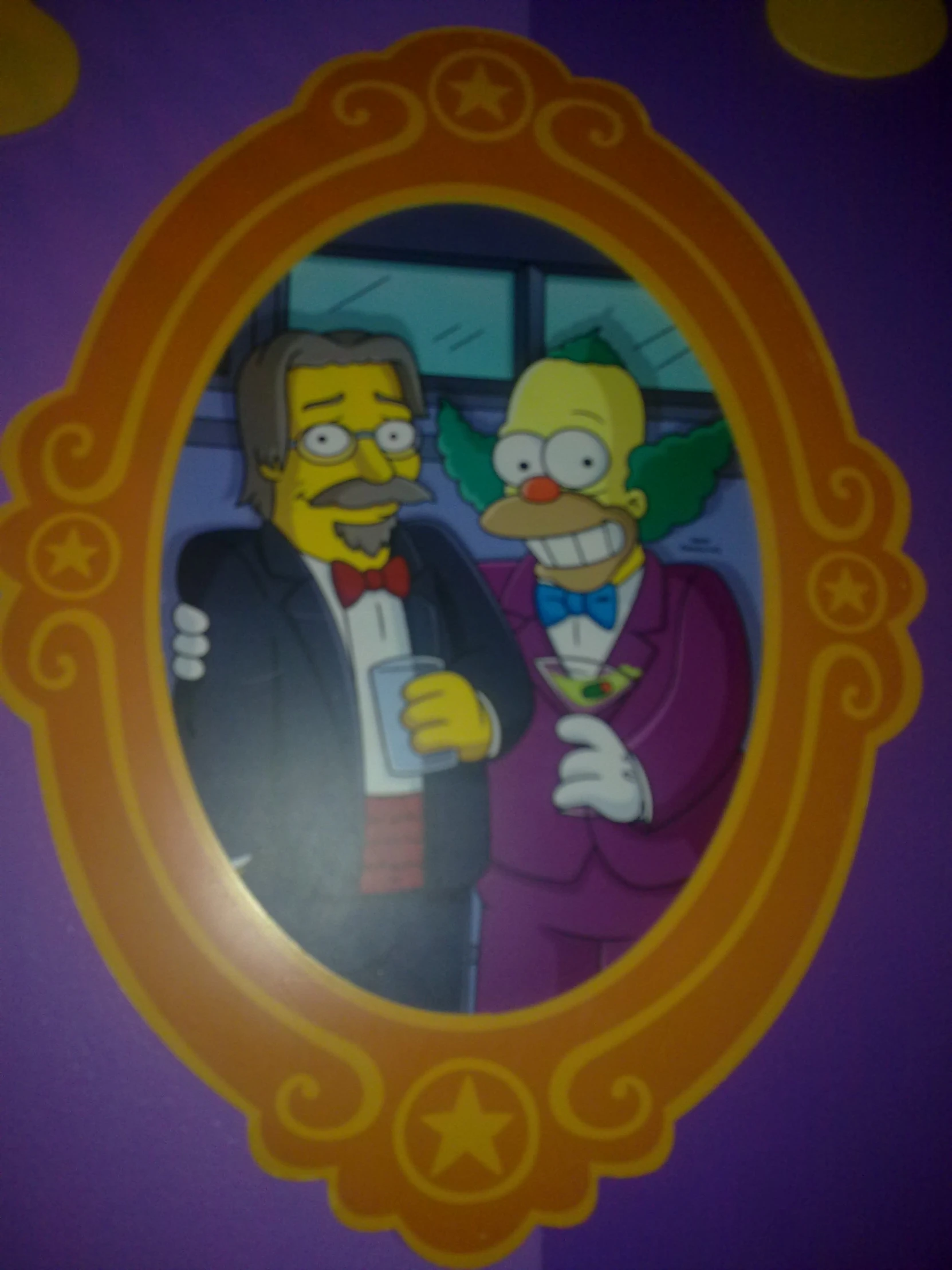 a cartoon image with simpsons and the man in the mirror