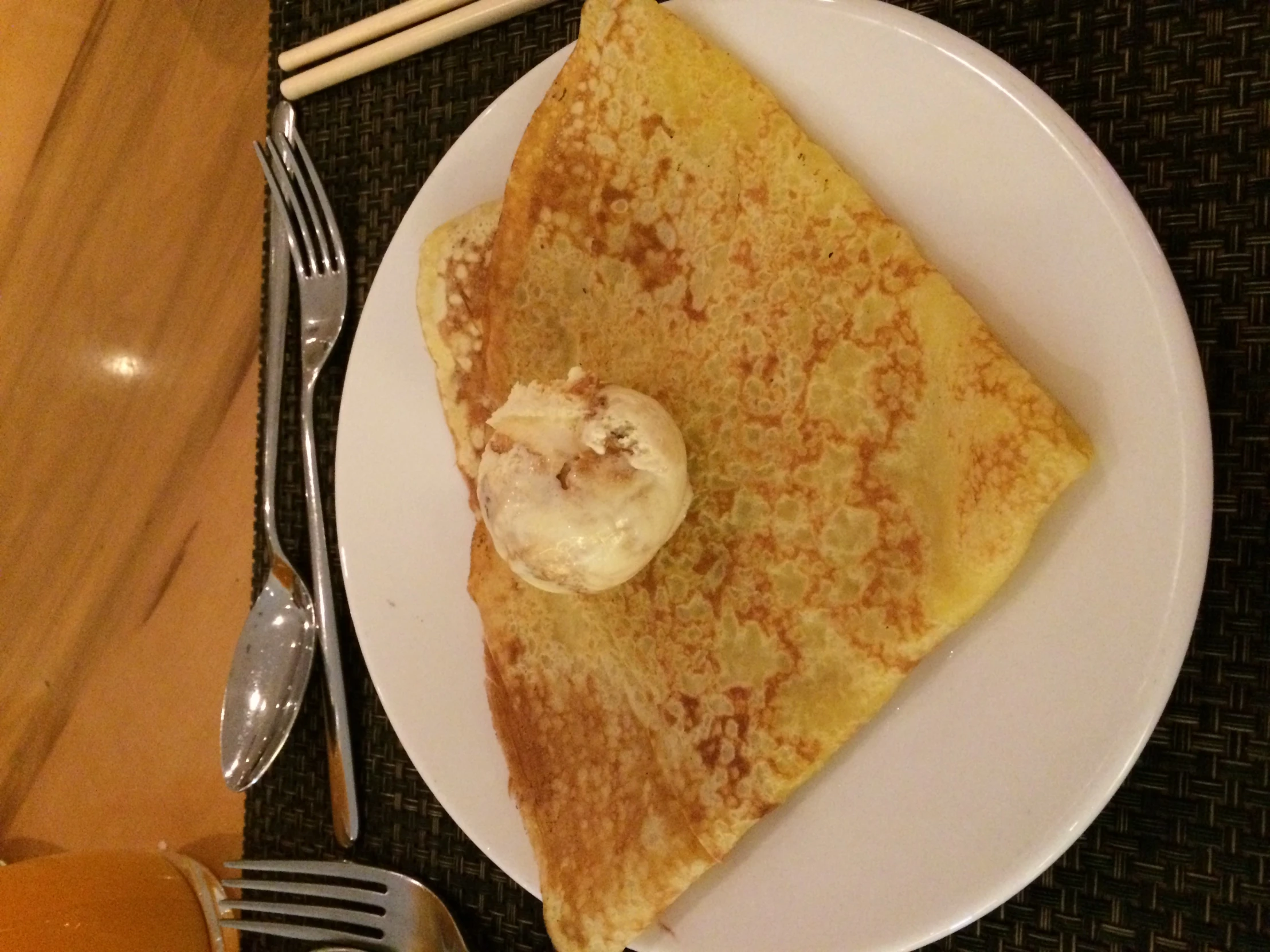 a breakfast plate with pancakes on it and er and strawberries