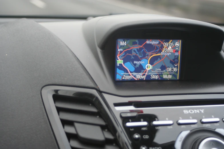 a map showing directions in the rearview mirror