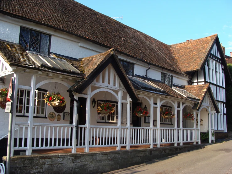 a large building has floral wreaths on the outside