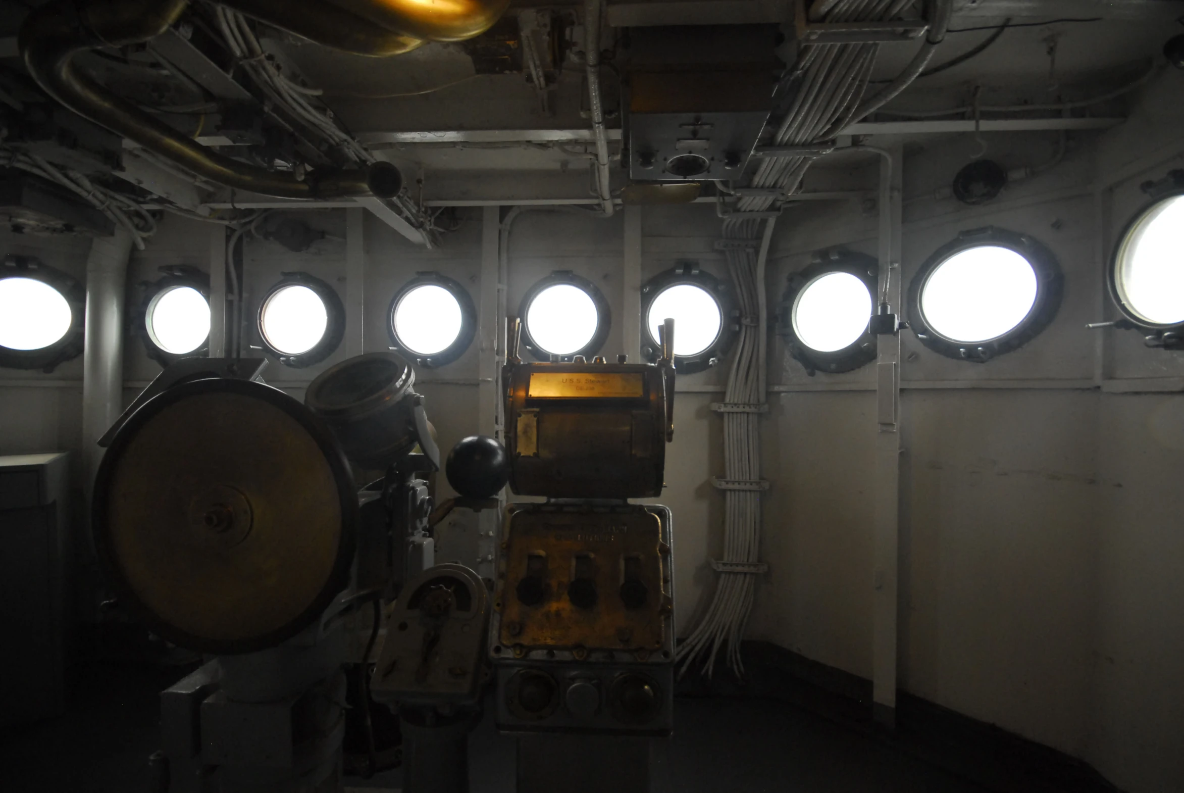 some big white windows inside of a ship