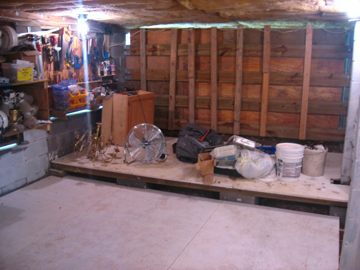 the garage is filled with a lot of work items
