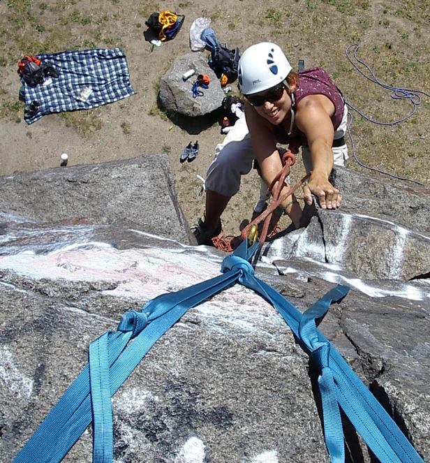 an image of a man climbin on a rock