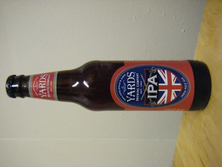 a bottle of beer with the flag on the label