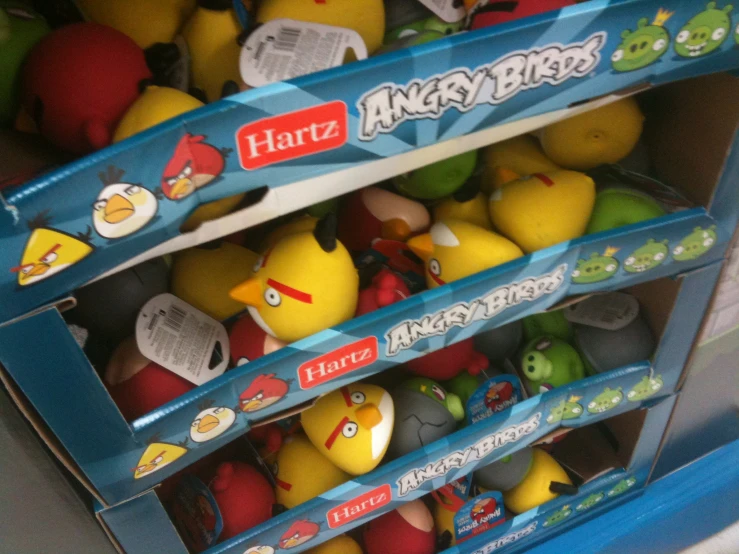 several angry birds are stacked in different boxes