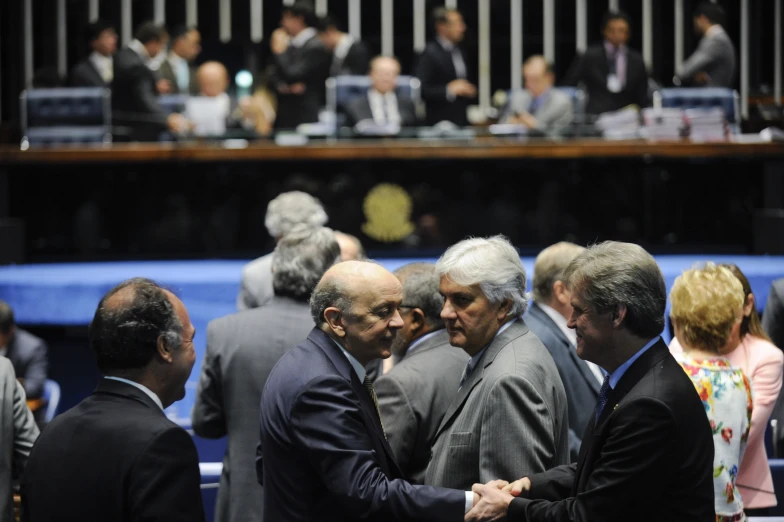 two men shaking hands at a business meeting