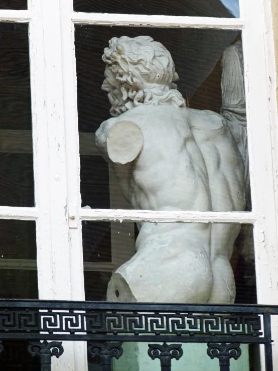 an image of a statue outside the window