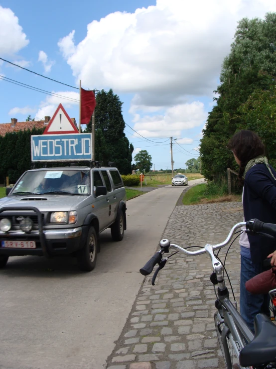 a car and some motorcycles on a road