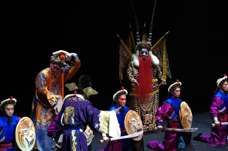 a group of men that are standing up with swords