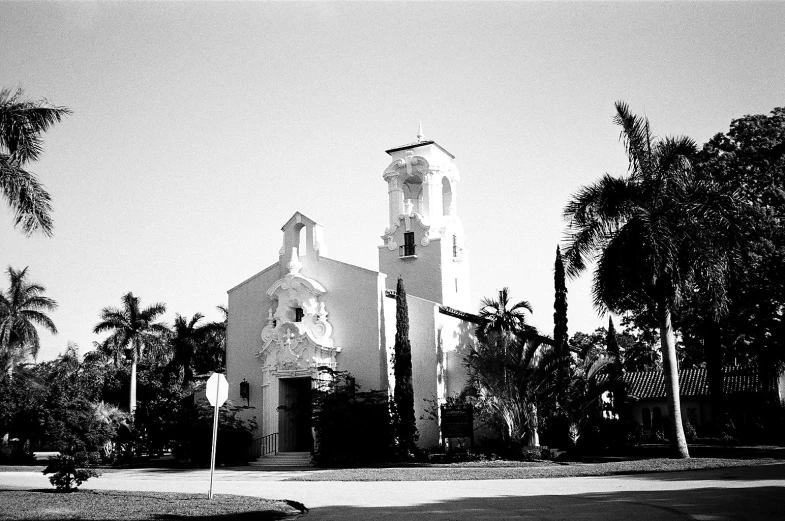 a dark black and white pograph of an old church