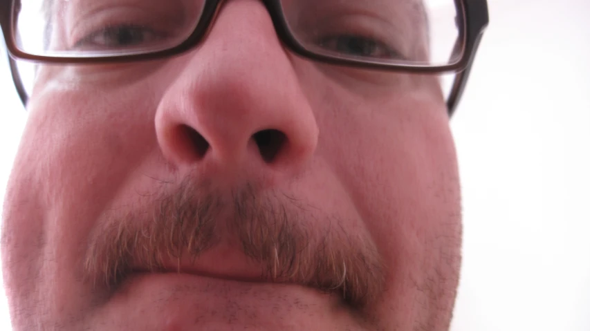 an image of a close up view of a mans face