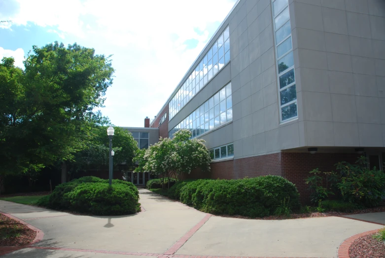 an office building with several different landscaping areas