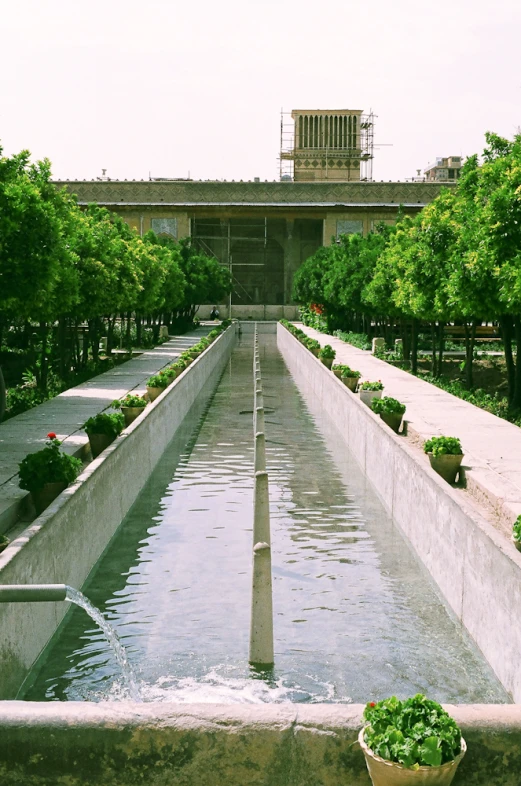 the water is flowing from the center of the park