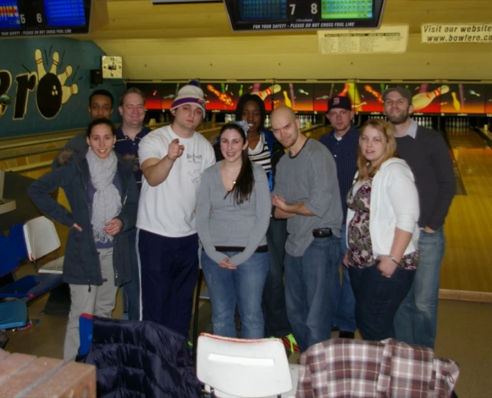 the group of people are posing for a picture