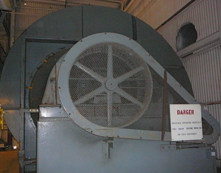 a large industrial type fan in the warehouse