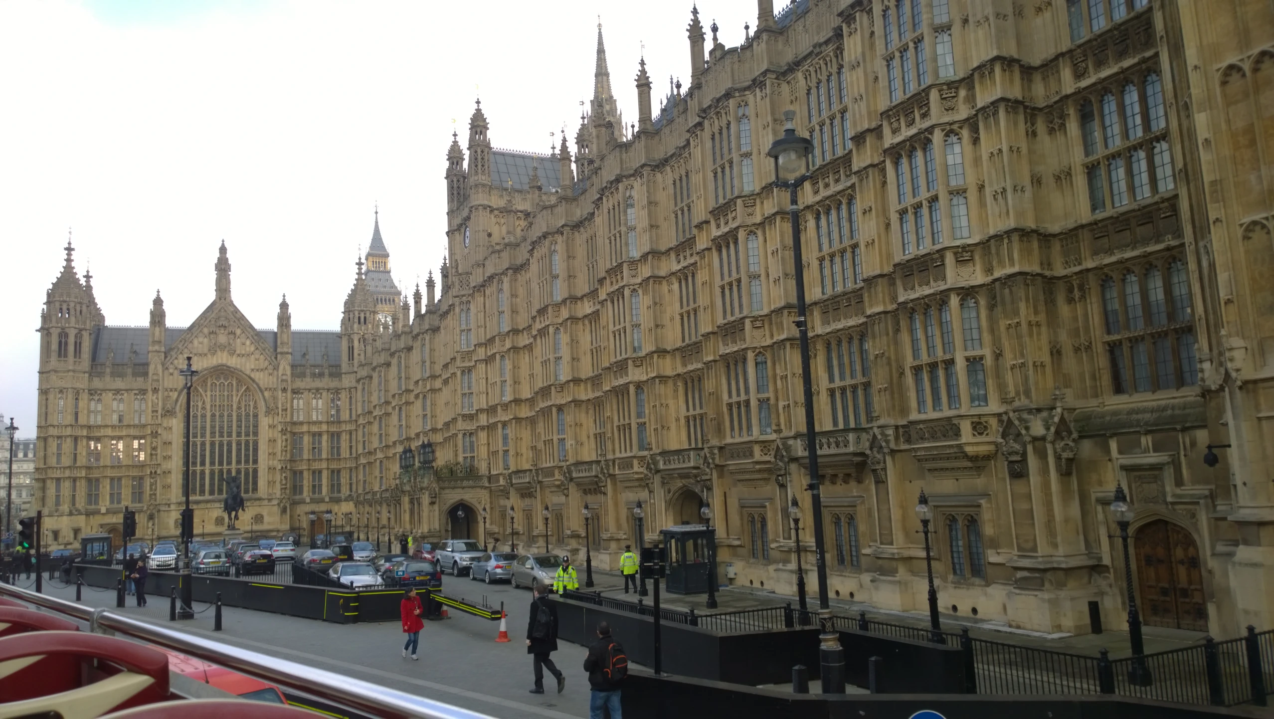 the view from an outside cafe looking at the buildings