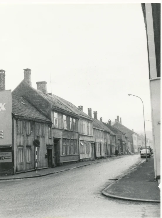 old fashioned buildings line a street corner in an urban area