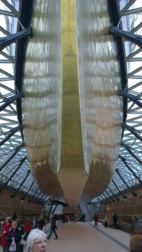 a large metallic object sitting inside of a building