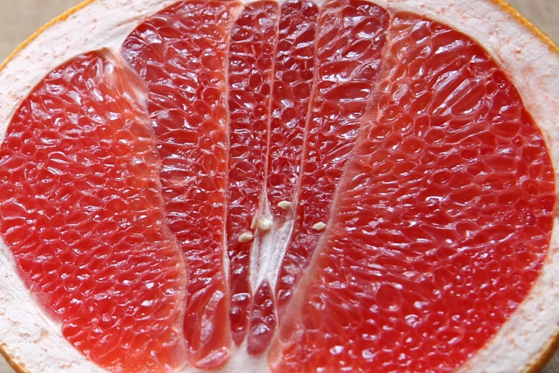the gfruit is sliced into halves on the table