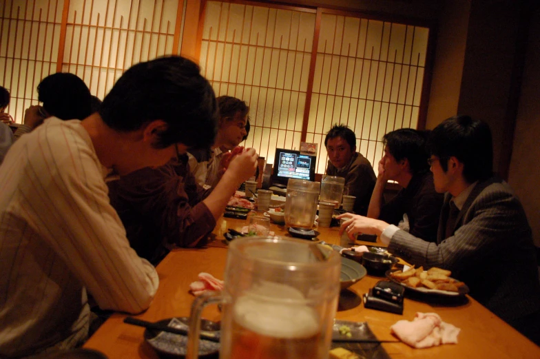 an image of people eating at the table