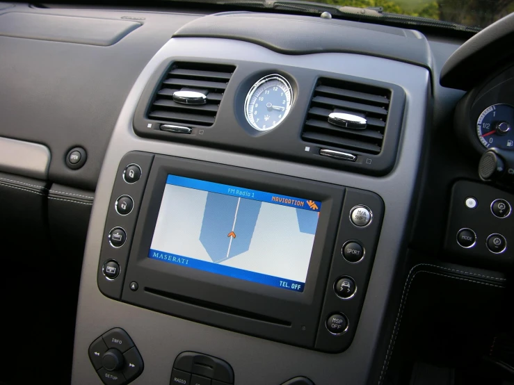 a digital screen inside the dashboard of a car